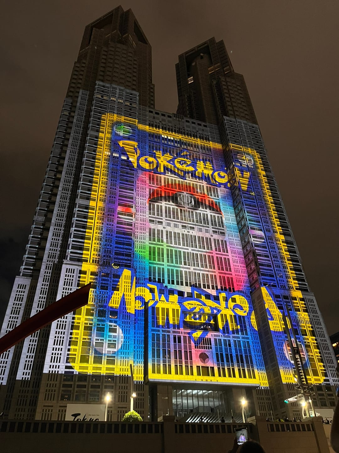 A Pokemon projection covering the whole facade of the Tokyo Metropolitan Government Building at night